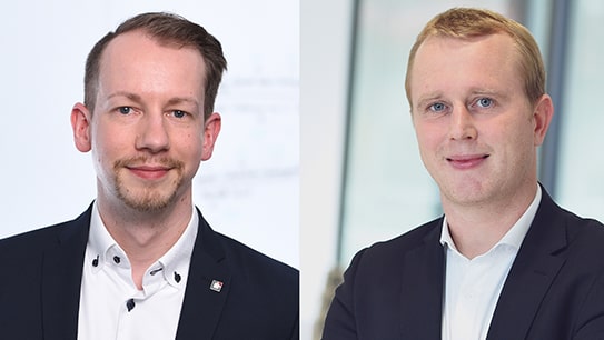 André Beschmann und Mathias Mewes, lächelnd als neue Prokuristen der BROCKHAUS AG, symbolisieren Führungsstärke und strategisches Wachstum.